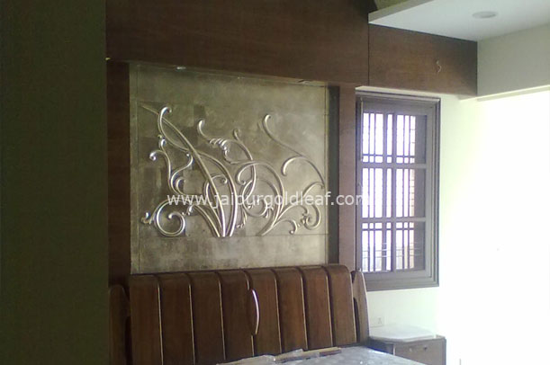 Champagne leafing atop Bed